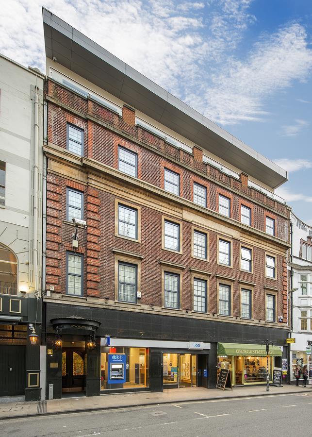 The George Street Hotel Оксфорд Экстерьер фото The former department store, now apartments